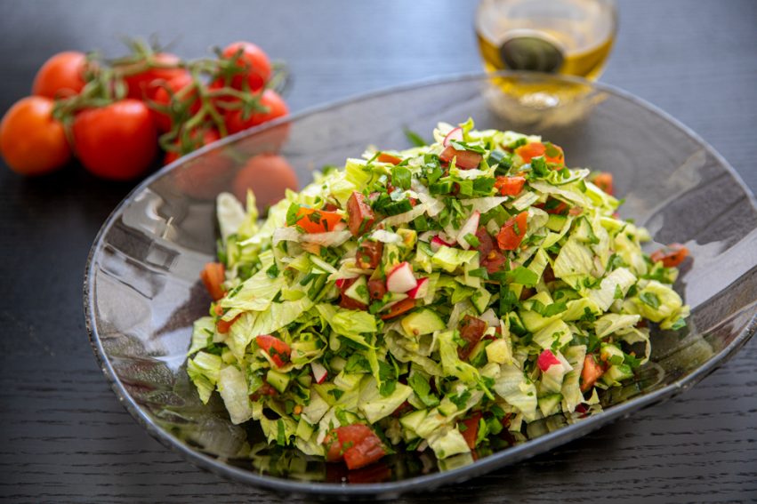 super herb salad served in a bowl