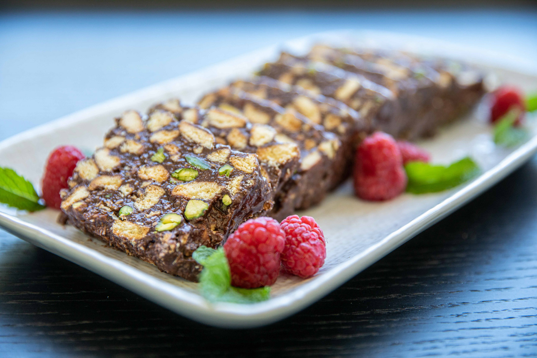 pistachio and coconut chocolate log slices